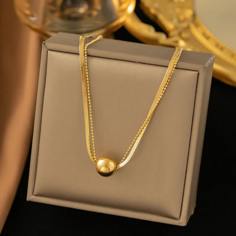 Collar Colgante bola redonda Impermeable NAXE Acero 304 Bañado en Oro